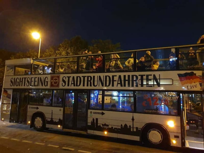 Berlin: Bus Tour by Night with Live Commentary - Alexanderplatz, the Red Town Hall, and the World Clock