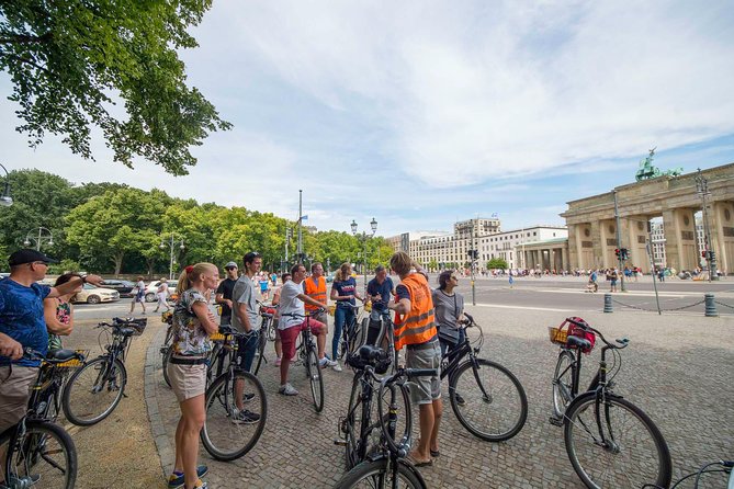 Berlin Highlights Sightseeing Bike Tour in Small Groups - Checkpoint Charlie and the story of division