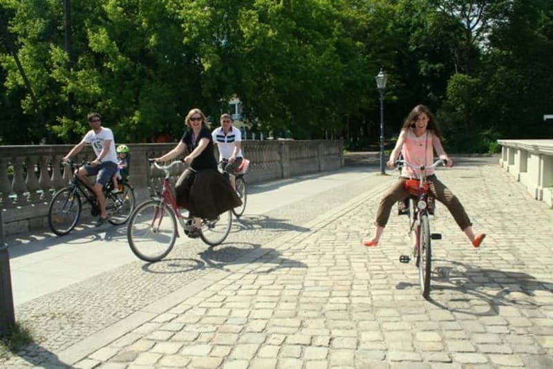 Berlin: Top Secret Berlin Guided Bike Tour - Bikes, baskets, helmets, and rainy-weather planning