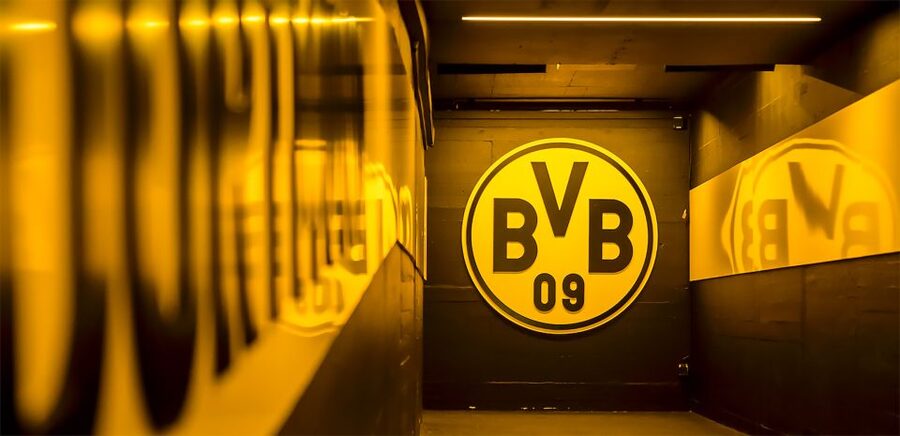 BVB Signal Iduna Park: Stadium Access and Self-Guided Tour - Sitting in the dugout and seeing the coaching zone