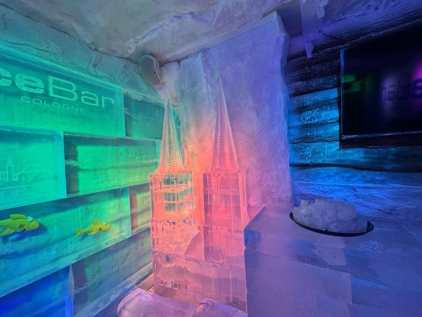 Cologne: IceBar Entry Ticket with Drinks - Getting dressed for the frozen room