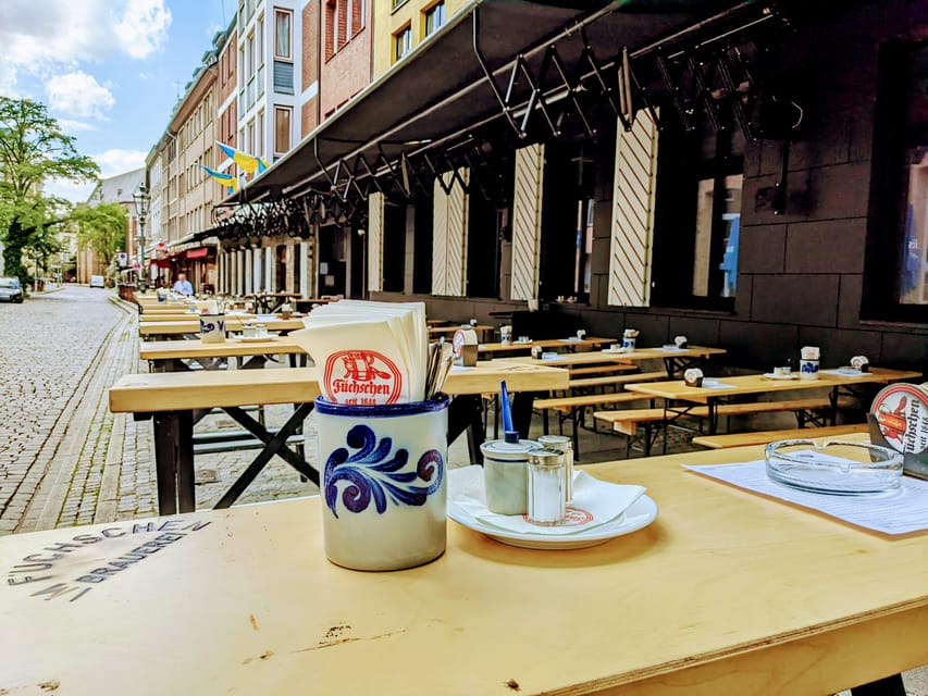 Düsseldorf: Tipping based - Old Town Walking Tour - From Königsallee’s luxury shops to Düsseldorf’s old lanes