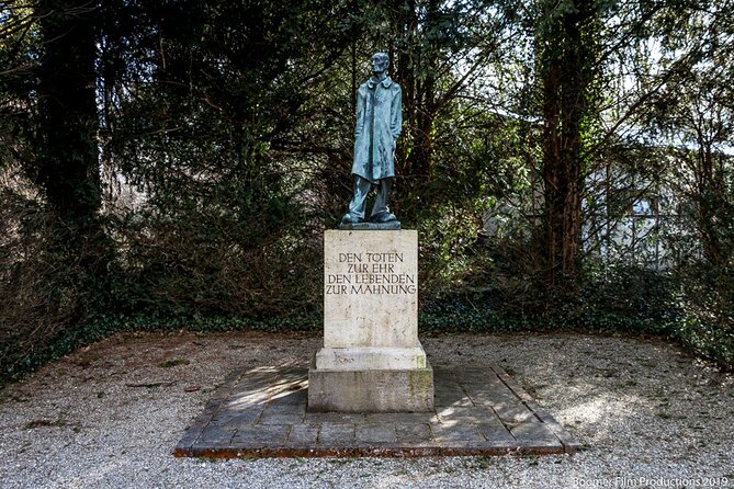 Full-Day Dachau Concentration Camp Memorial Site Tour from Munich - Entering through the Jourhaus