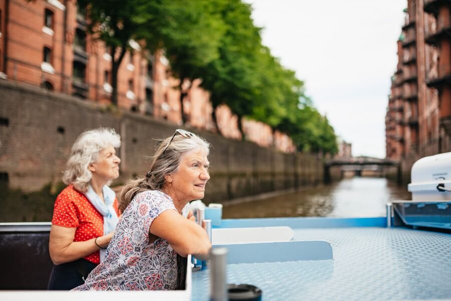 Hamburg: 2-Hour XXL Port of Hamburg Cruise Tour - Passing through locks on a low, compact boat