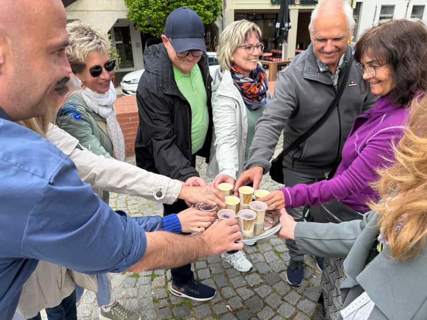 Munich: Viktualienmarkt Food Tasting Tour in German - Bavarian antipasti and international tastes