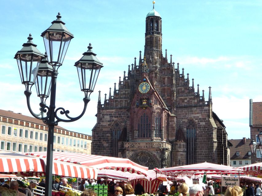 Nuremberg Old Town and Nazi Rally Grounds Walking Tour - Hauptmarkt, churches, and local food advice